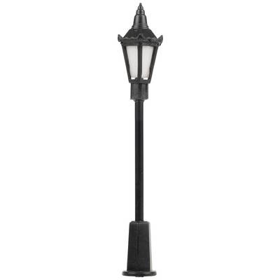 A classic black street lamp with decorative details, suitable for urban or historic settings.