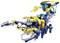 The image depicts a robot set in the shape of a yellow and blue shark, comprising modular parts.