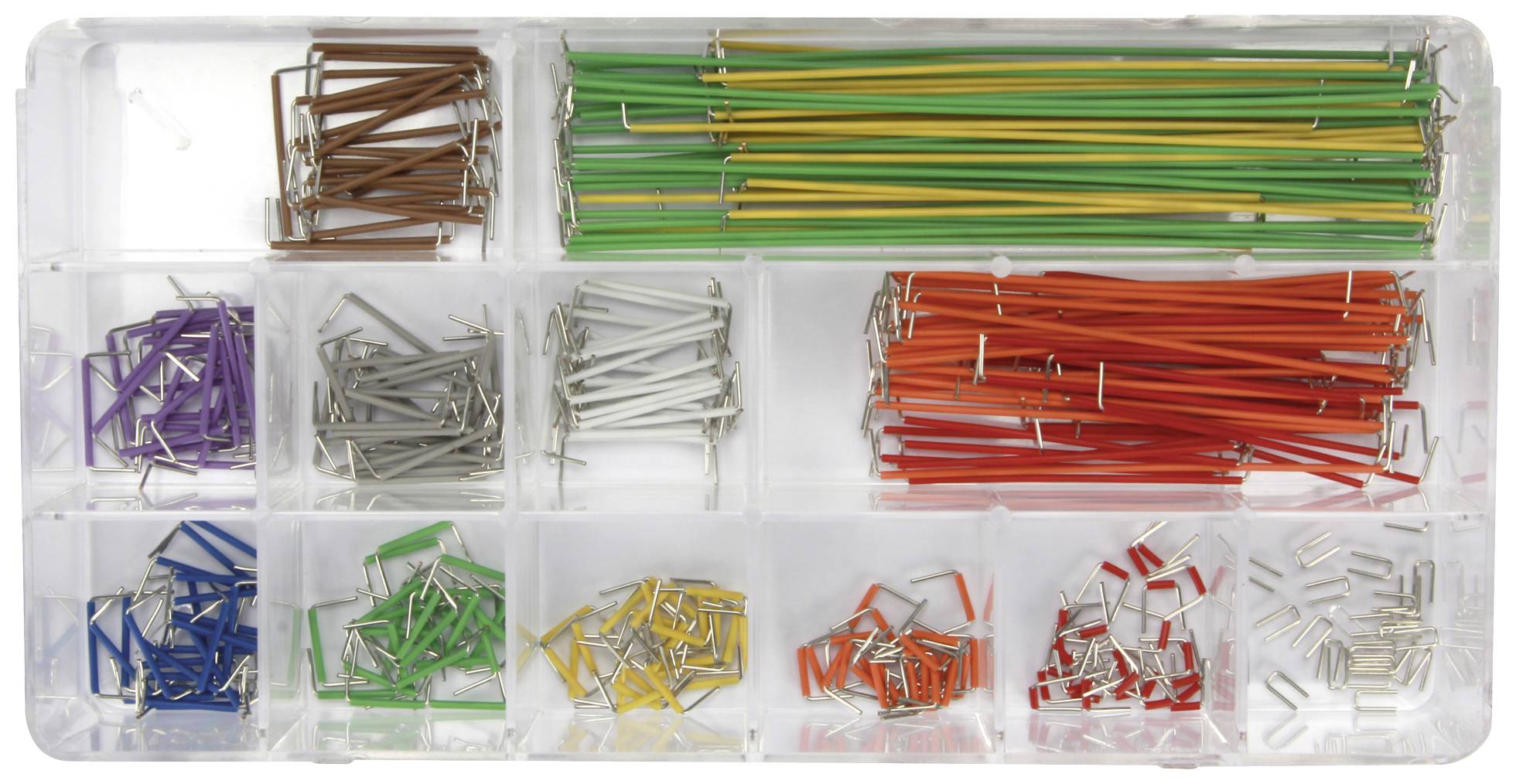 Sorted box containing colourful wire bridges of various sizes and colours: green, yellow, red, brown, purple, and grey, for electronic assembly.