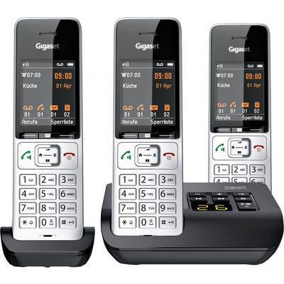 Three cordless phones with base station. Displays show time, date, calls and menu options. Main phone in charging station.