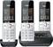 Three cordless phones with base station. Displays show time, date, calls and menu options. Main phone in charging station.