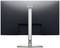 Rear view of a Dell monitor with a slim, height-adjustable stand.