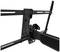Black metal TV wall mount, adjustable and with mounting screws for various screen sizes.