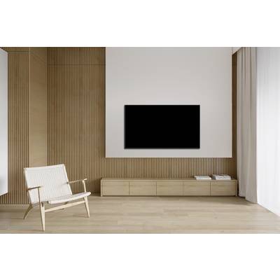 Modern minimalist room with a flat-screen television mounted on wooden panelling, an armchair and a sideboard.