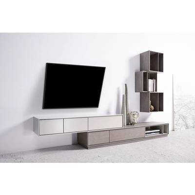 Living room with modern, minimalist design: flat-screen television mounted on the wall, hanging and standing shelves in wood-effect finish.