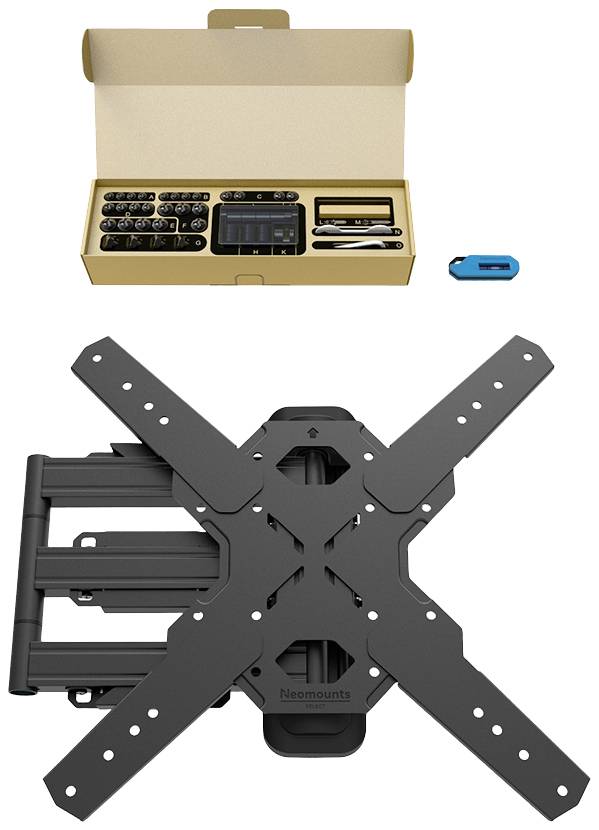TV wall mount with accessories; shows open box with mounting kit, screws and tools, and a black, cross-shaped bracket.