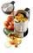 A stainless steel blender filled with chopped vegetables such as carrots and courgettes. Fresh tomatoes are placed beside it.