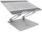 An adjustable metal laptop stand with ventilation slots and a grey surface design, suitable for ergonomic adjustment.
