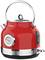 A red kettle with temperature display, maximum water level indicator, and silver handle.