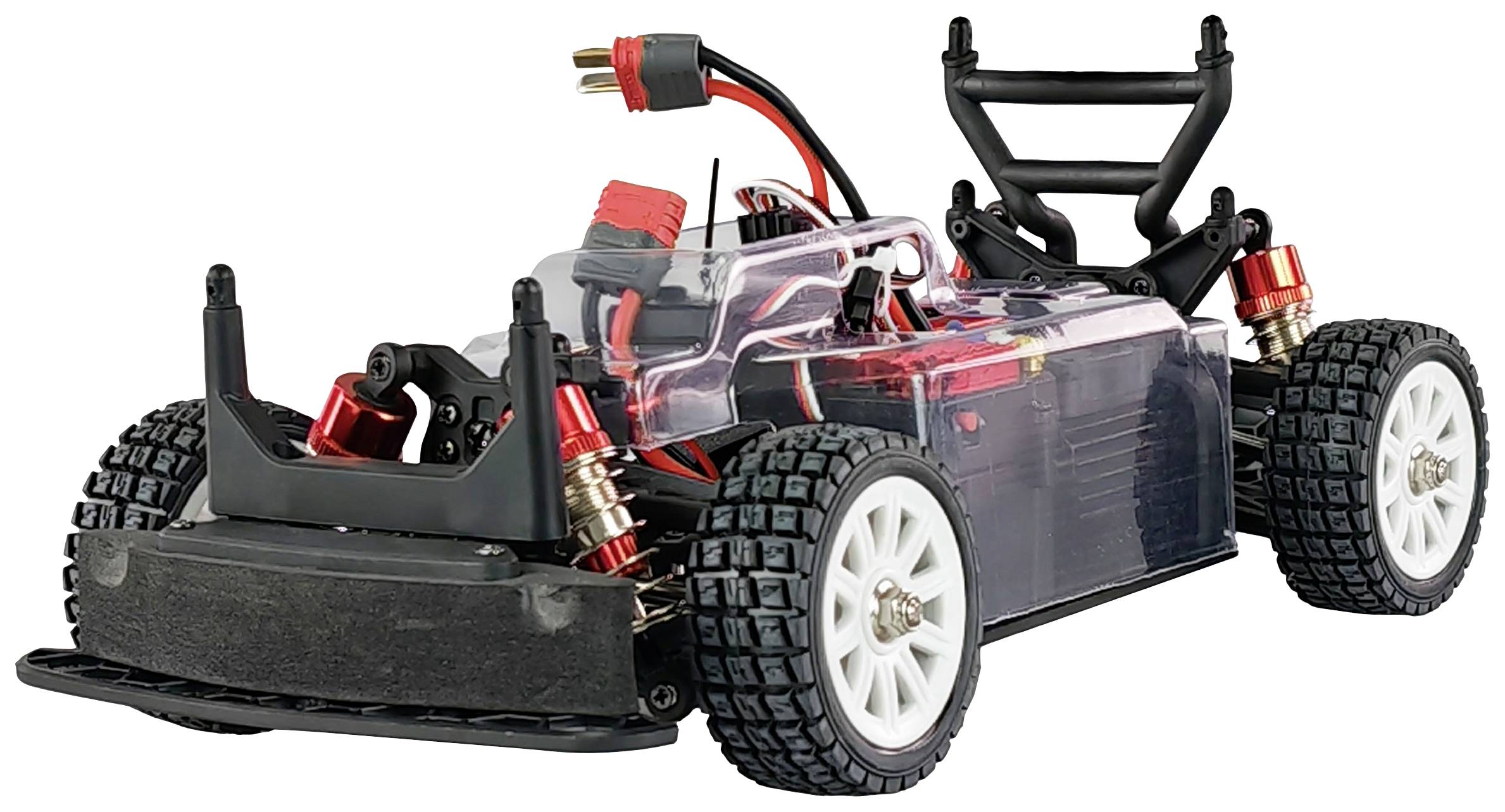 A remote-controlled car without bodywork reveals the motor, wiring, and suspension. Large tyres suitable for off-road driving.