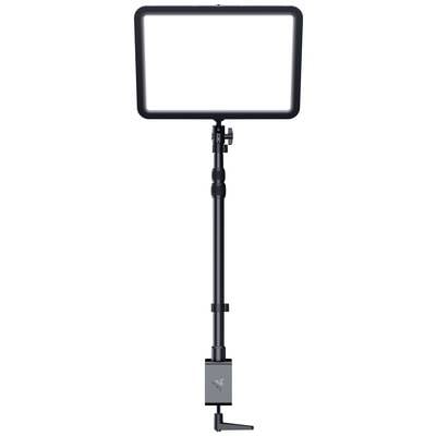 A rectangular LED light on an adjustable stand, suitable for video recordings or photography, appears in the centre of the image.
