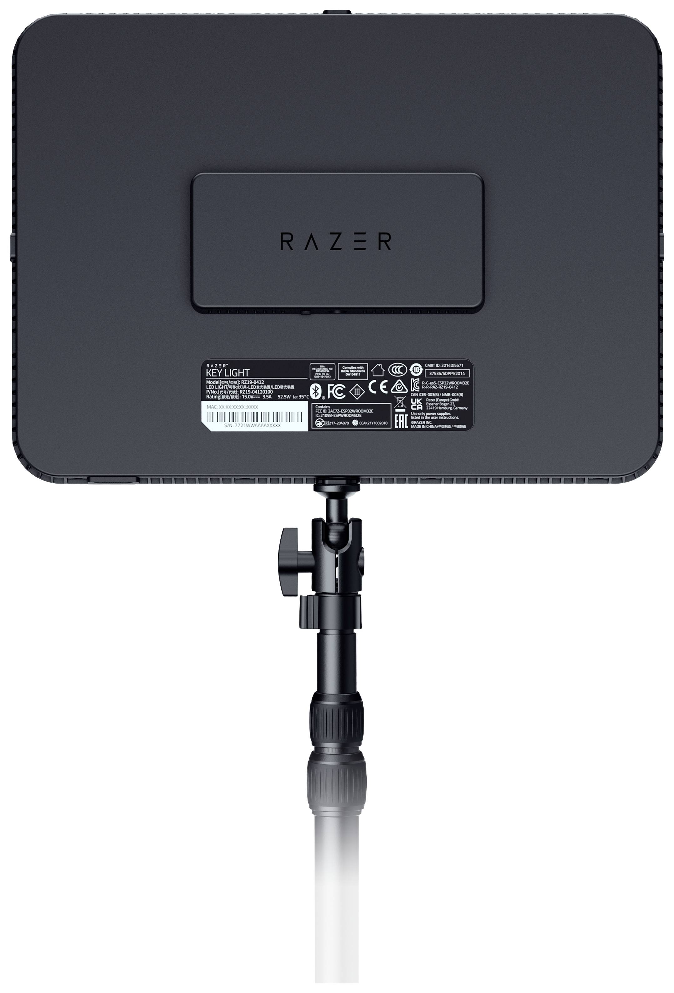 A rectangular, black Razer device on a stand, with various markings and safety symbols on the back.