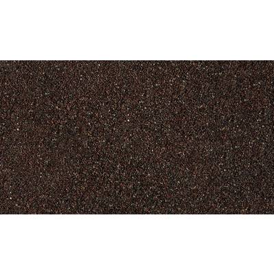 Close-up of brown, granular sandpaper, showing a rough texture.