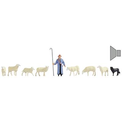 Shepherd figure with staff, surrounded by sheep and a dog. The image depicts a scene of rural life with animals.
