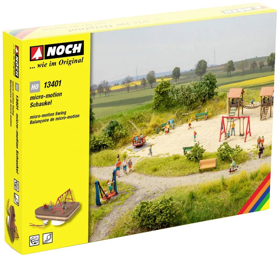 Packaging for a model railway accessory swing in H0 scale. Depicts a miniature landscape with people, trees and a playground.