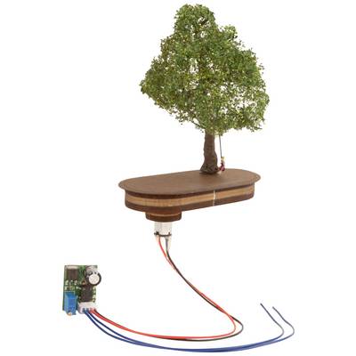 A model tree on a wooden platform, connected with electronic wires and a circuit board for technical or physics demonstrations.