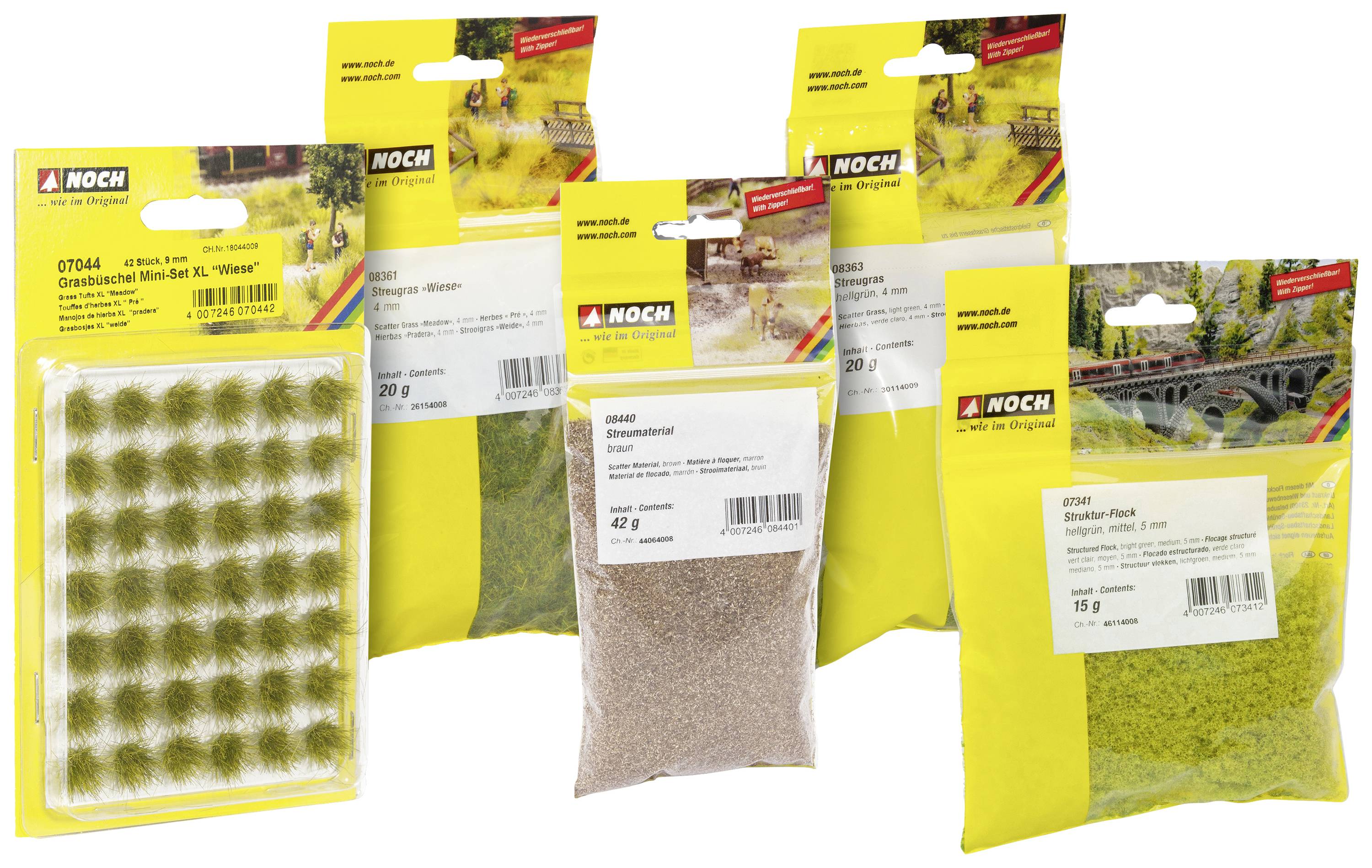 Five packets of model-making accessories by "Noch": grass mats, scatter material, and grass flakes. Ideal for model railway landscapes.