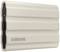 External Samsung hard drive in a wavy, sand-coloured casing with a USB-C port on the side.