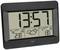 Digital clock with large display shows the time as 13:57 and weather information. Indoor and outdoor temperatures as well as weather conditions are displayed.