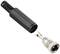 'An open BNC plug in two parts: a black housing and a silver connector.'