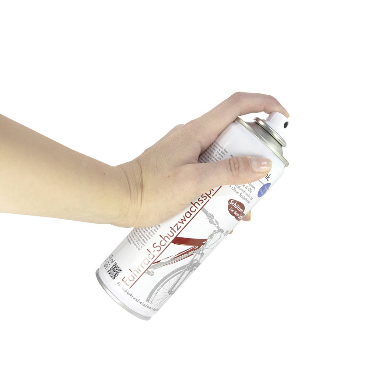 A hand is holding an aerosol spray can labelled 'Bicycle Protective Wax', for the care and protection of bicycles.