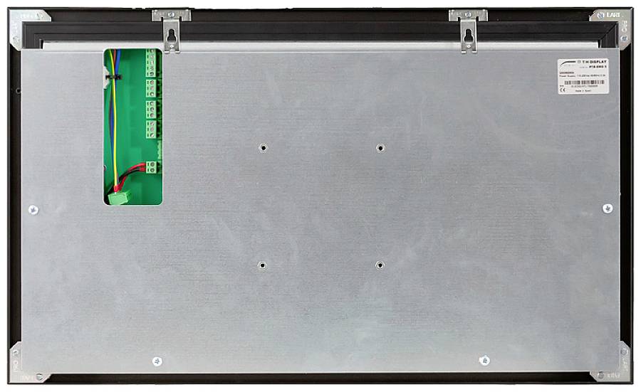 Back of an electronic device with a metal cover and open space revealing wiring. Several mounting brackets visible at the top.