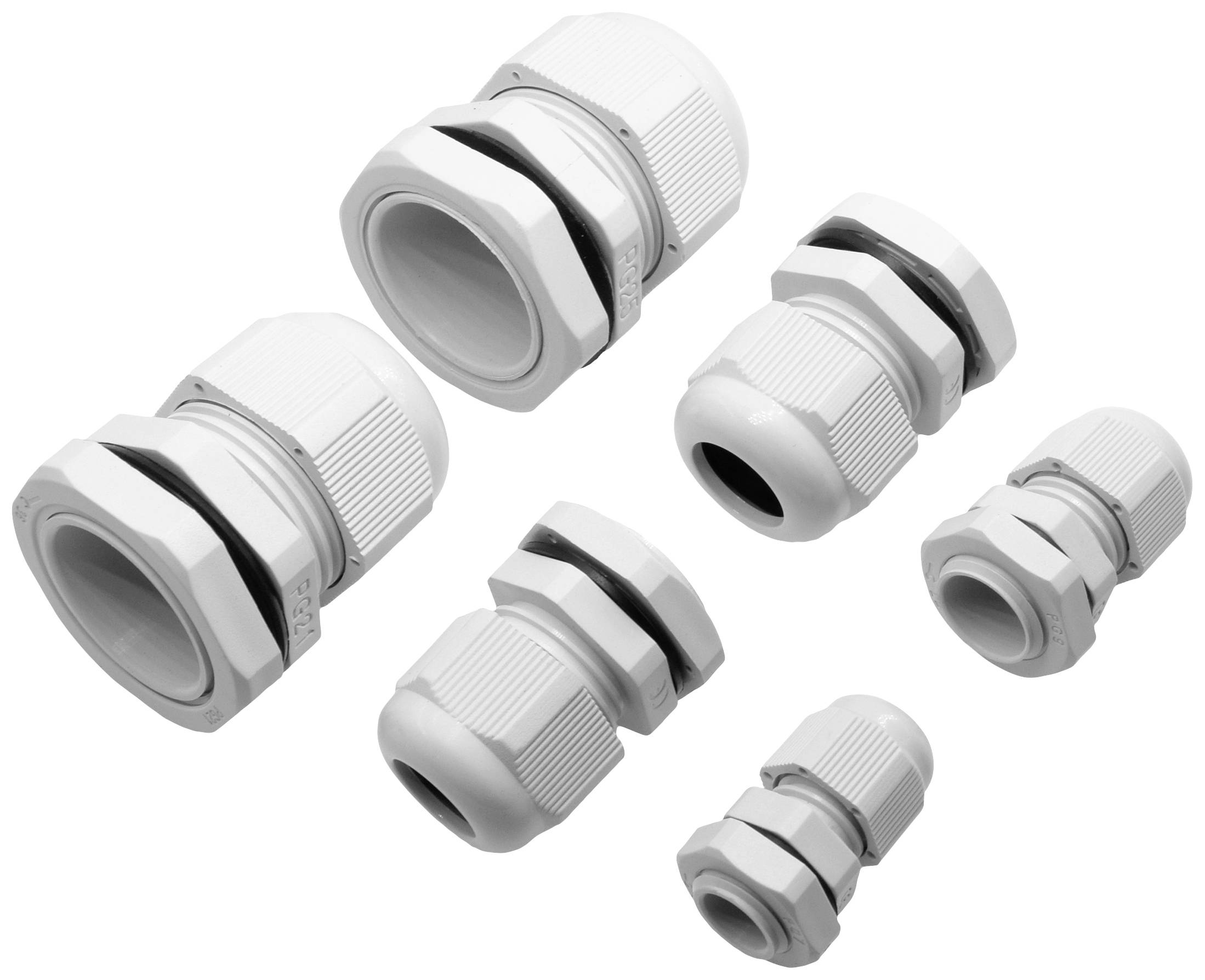 Several white cable glands in various sizes, arranged on a white background. They are used for cable sealing and routing.