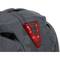 A bicycle helmet with a red LED rear light, with an on/off button visible. The pattern shows a stylised city map.