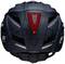 Black bicycle helmet viewed from behind, with a red, triangular rear light and reflective strips, suitable for cycling safety.