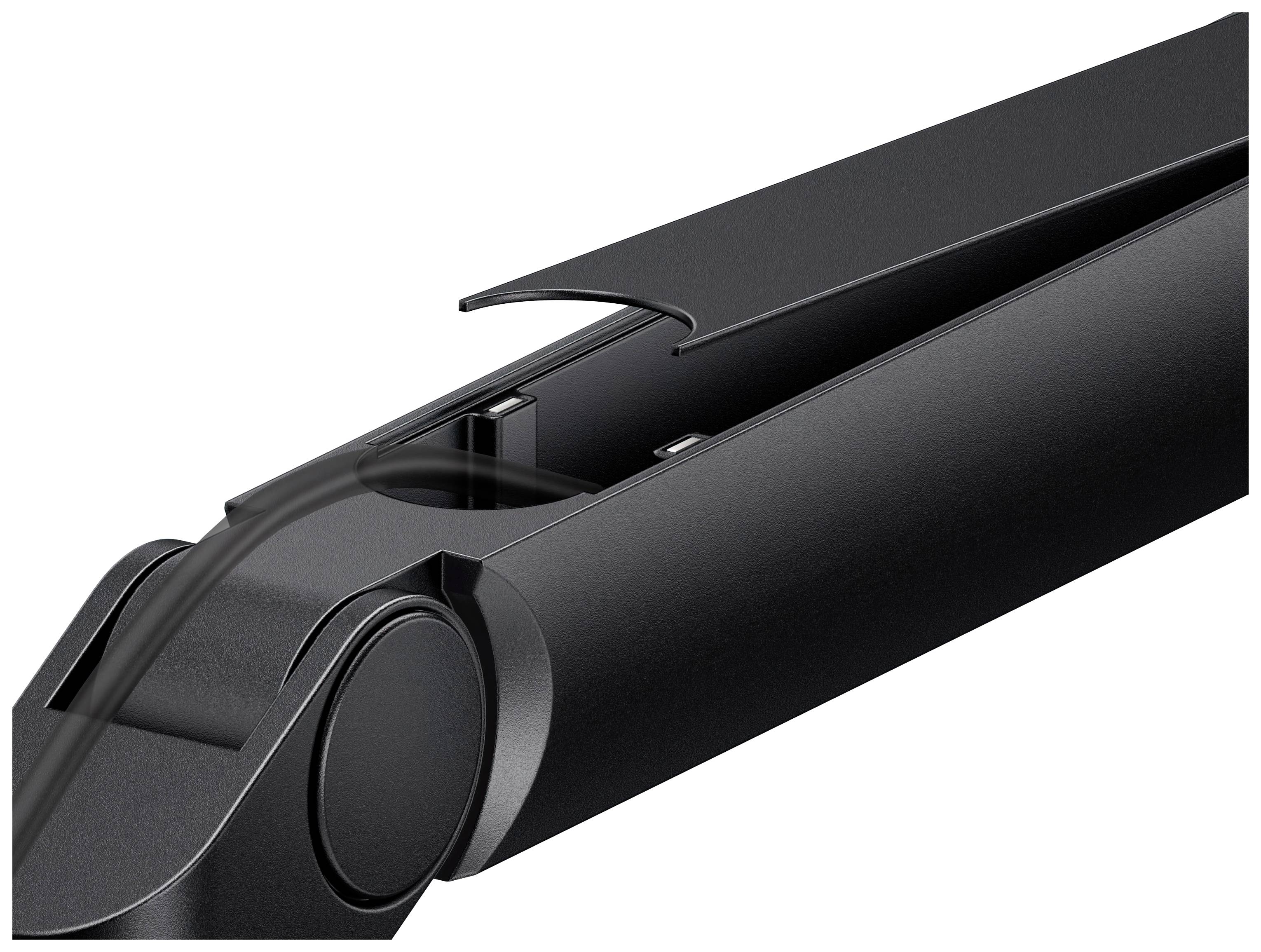 Close-up of a black folding mechanism with smooth, modern edges, partially open, revealing precise details and craftsmanship.