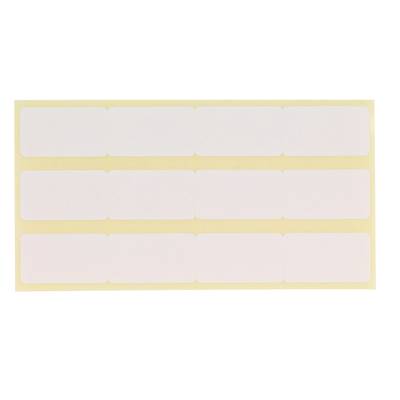 A sheet with twelve rectangular, white labels on yellow backing paper.