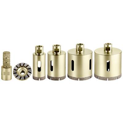 Six different golden diamond drill bits of varying sizes for tile processing, arranged side by side.