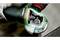 A Metabo angle grinder is shown at work, with focus on the exposed motor area and a glowing marking.