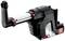 Tool in a plastic casing, with a metal rod and red button, likely an accessory or adapter for a larger machine.