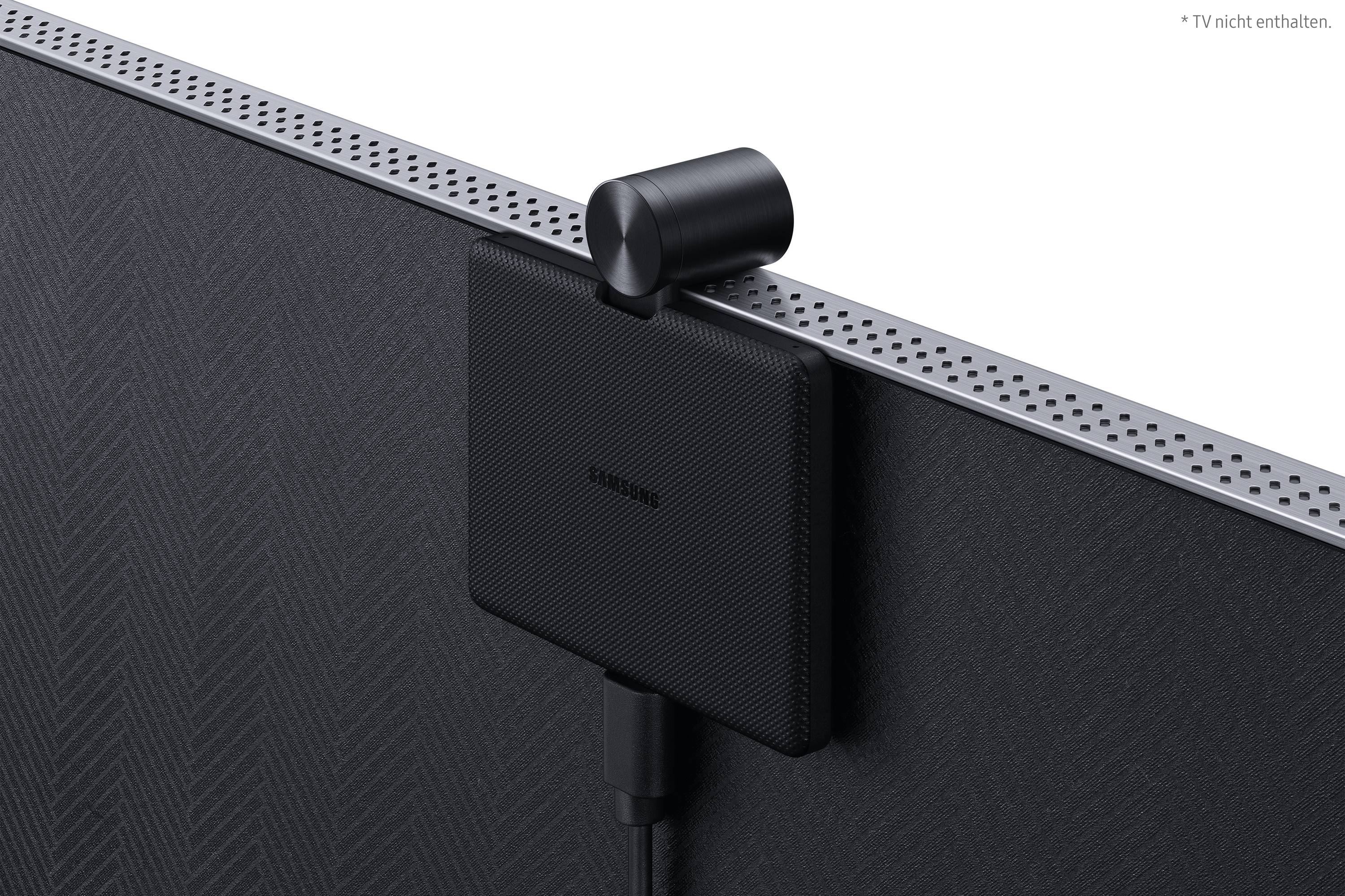 External hard drive with cable attached to the back of a television, TV not included.