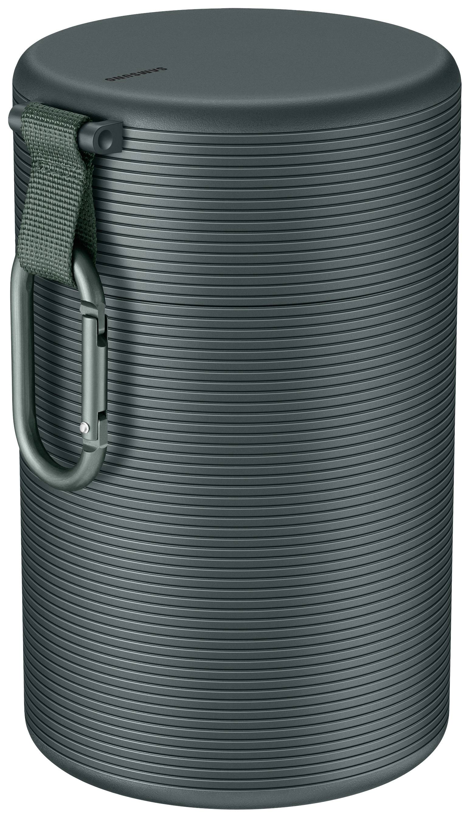Dark green, cylindrical Bluetooth speaker with a ribbed surface and integrated carabiner for transportation.