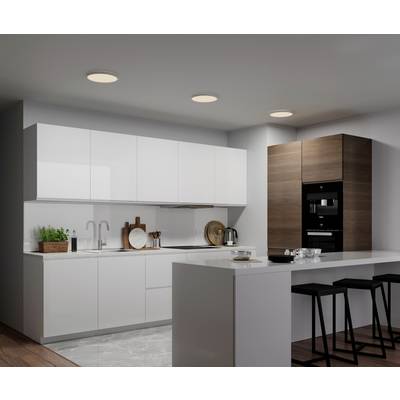 Modern kitchen with white cupboards, a black oven in wooden cladding, an island worktop and two bar stools.