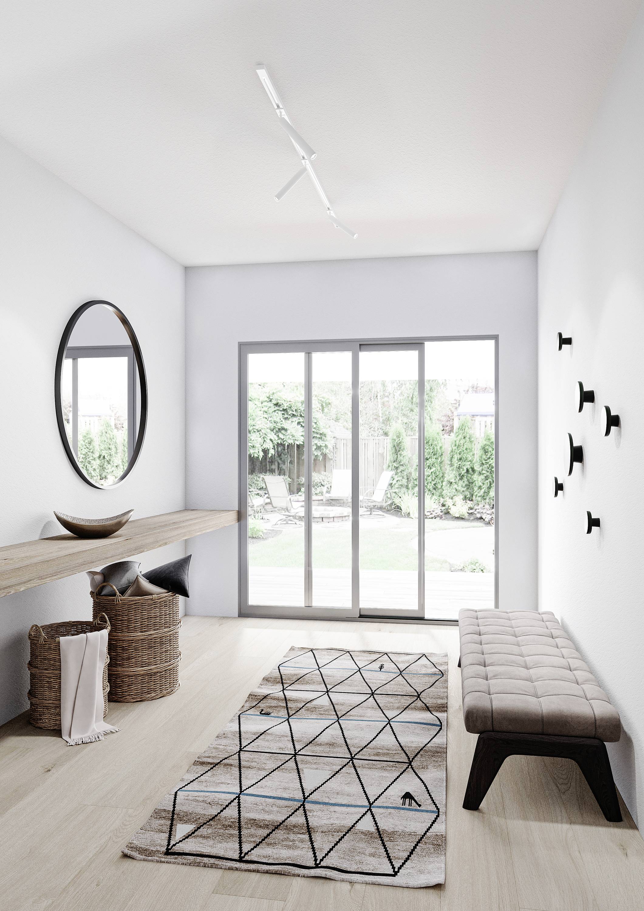 A bright hallway with wooden flooring, a bench, a round mirror and a rug leads to a large window overlooking a garden.