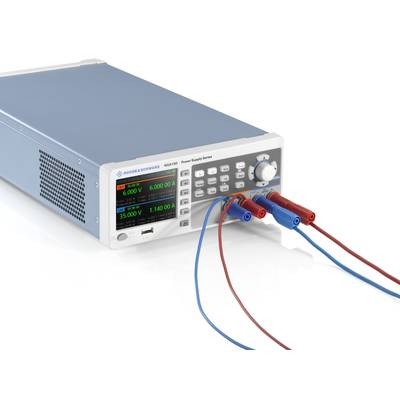 A grey electronic device with a display and multiple buttons. Three colourful cables are connected to the front.