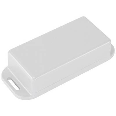 A white, rectangular plastic lid with rounded corners and a small recess on one side lies flat on a surface.