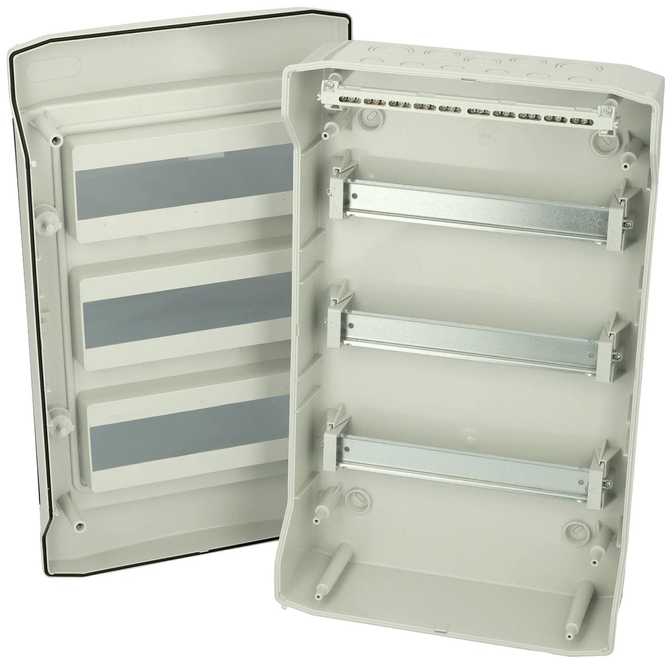 Opened electrical distribution cabinet with three metal carriers and transparent covers, ready for module installation.