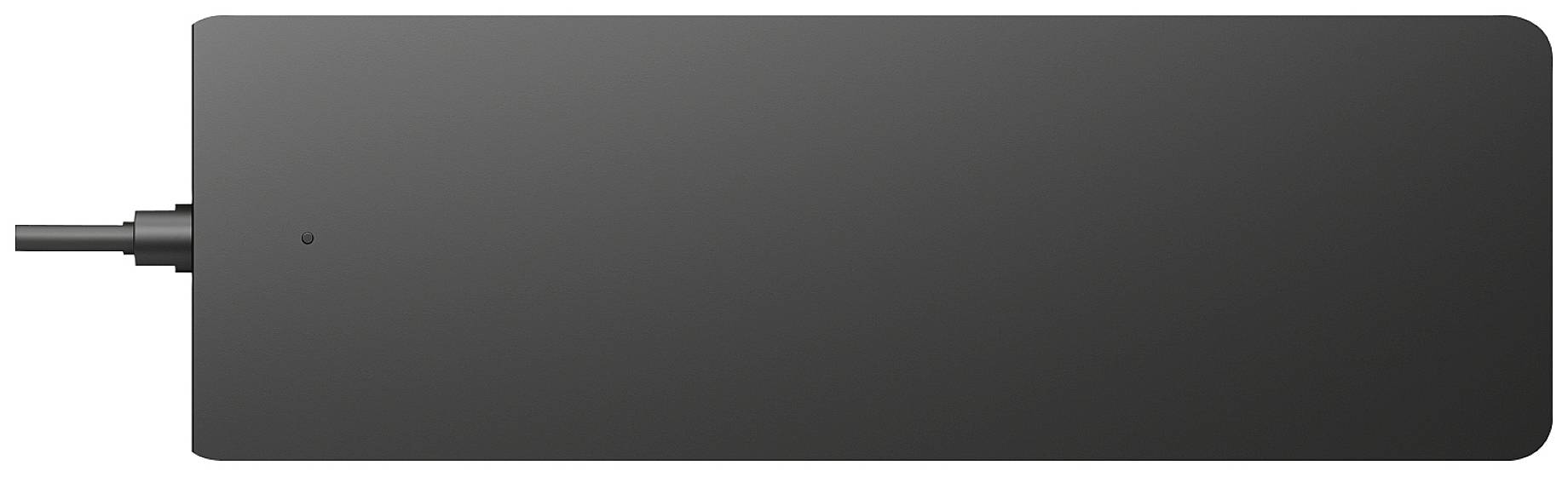 A rectangular, dark device with rounded corners and a cable connection on the left-hand side.