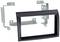 Radio fascia mounting kit, comprising a black plastic frame and two metal mounting brackets.