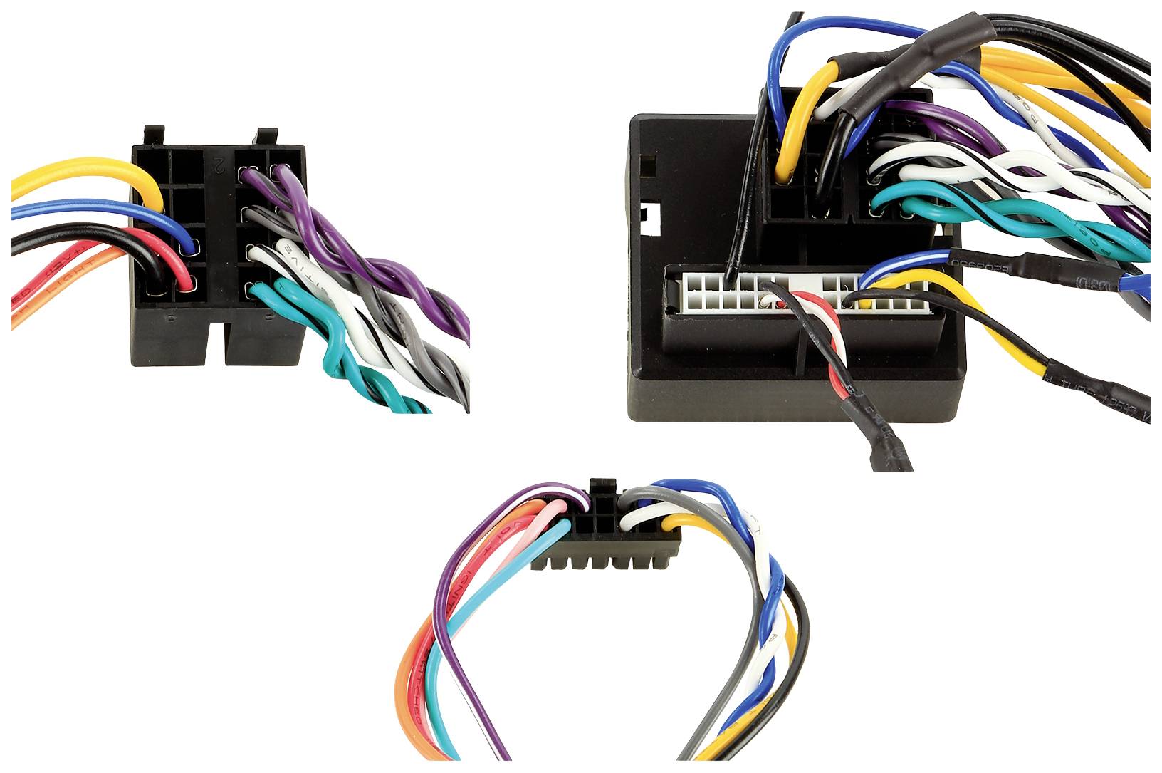 Various cable harnesses with coloured wires plugged into electrical connectors in a vehicle adapter.