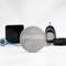 An Energizer button cell lies in the foreground, surrounded by electronic devices and a car key.