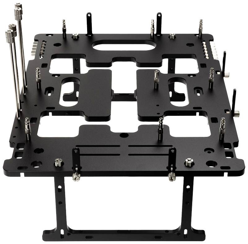 Black PC benchmarking table with adjustable mounting brackets and supports for hardware components, positioned upright.