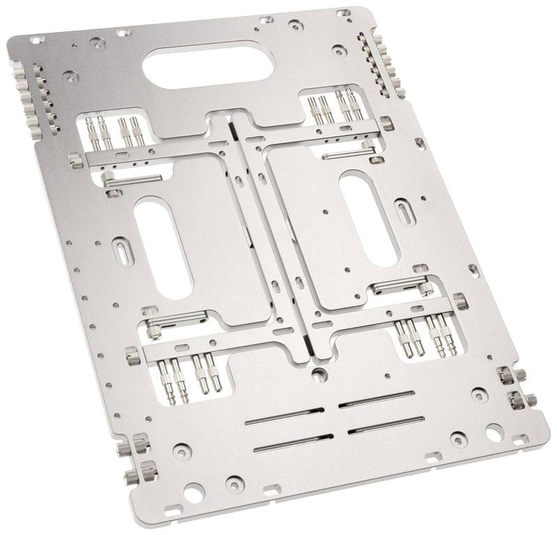 Metal plate with symmetrical cut-outs and mounting points, potentially part of a mechanical or electronic device.