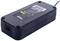 A black power supply with a technical label on the top surface; contains warning notices and type specifications.