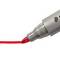 A red pencil marks a red line on a white background, with a metallic casing showing the felt-tip pen nib in a writing motion.