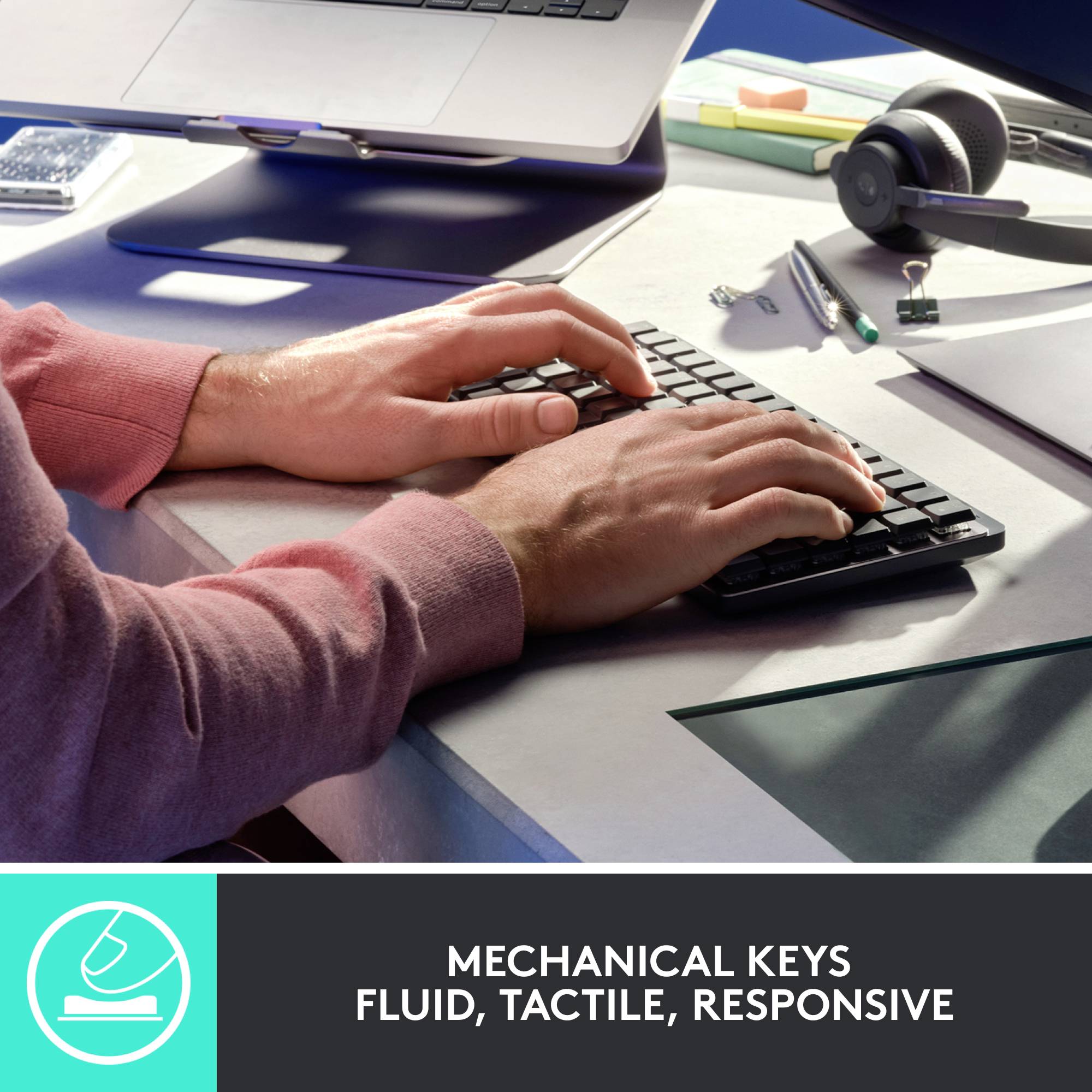 Two hands typing on a mechanical keyboard, text: 'Mechanical Keys – Fluid, Pleasant, Responsive'